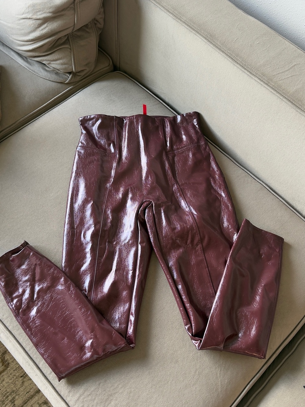 SPANX Faux Patent Leather Leggings in Ruby/Burgundy.